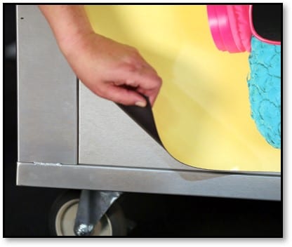 Peeling back the magnetic graphics on the QS line.