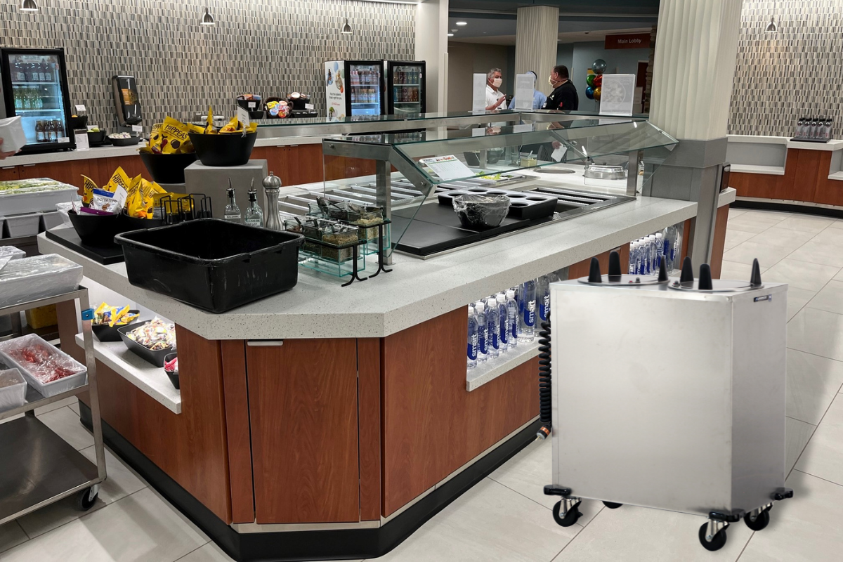 Multiteria serving counter and a Lakeside mobile plate dispenser in a dining hall.